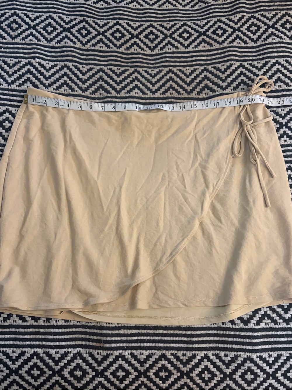 And now this Beige Tie-Detail faux Wrap Mini Skirt - Picture 2 of 5